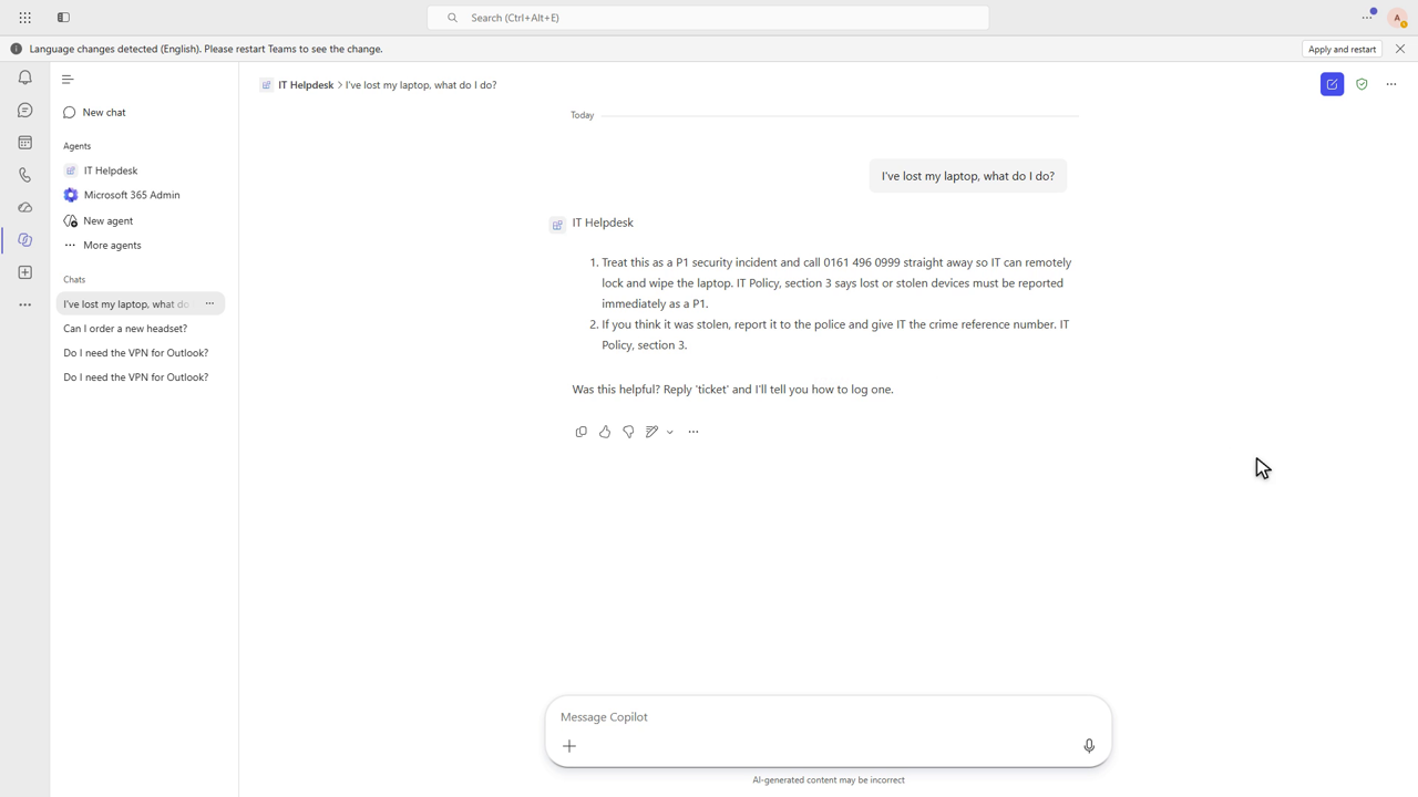 IT Helpdesk agent answering a lost laptop question in Teams